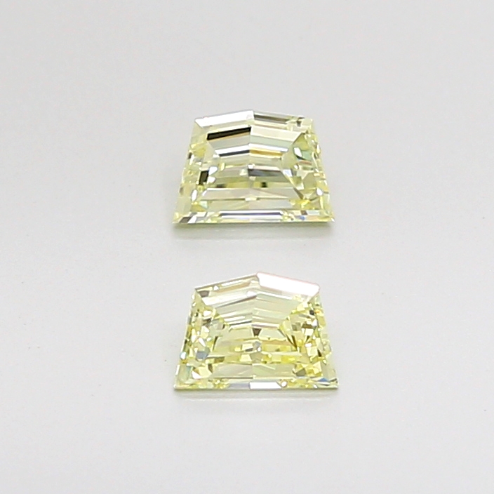Matched pair of Cadillac lab grown diamonds, 6.00 × 4.30 mm, Fancy Intense Yellow VS1, 1.09ct total
