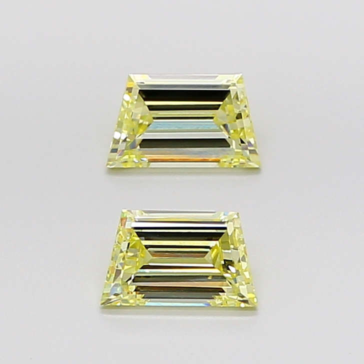 Matched pair of Trapezoid Step lab grown diamonds, 5.20 × 3.10 mm, Fancy Intense Yellow VS1, 0.58ct total