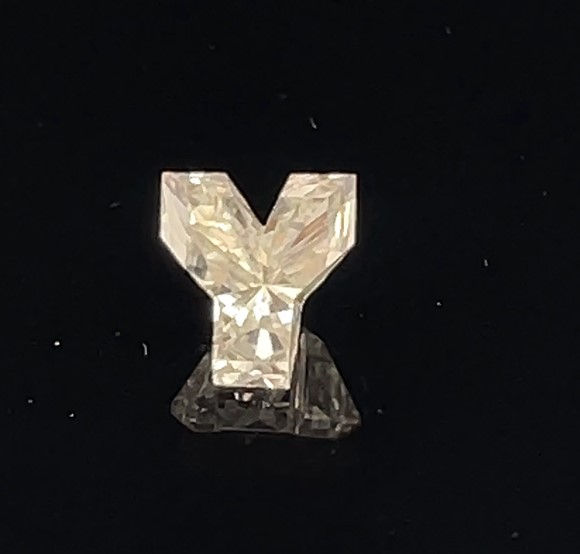 Matched pair of Alphabets lab grown diamonds, 7.00 × 6.43 mm, D VS1, 1.20ct total
