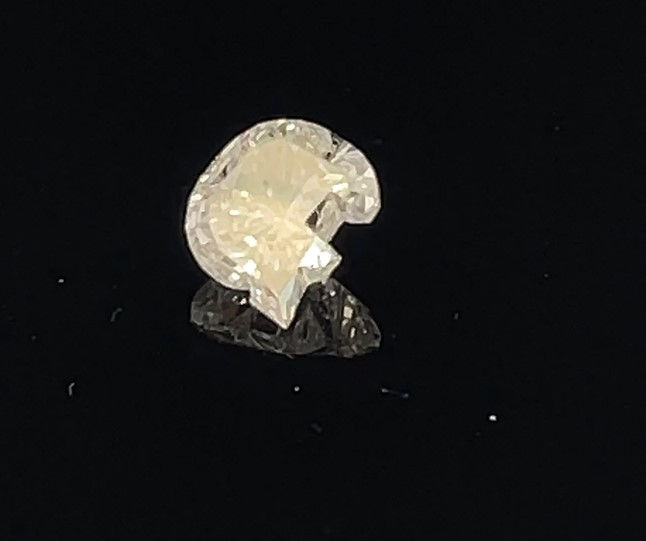 Matched pair of Alphabets lab grown diamonds, 7.05 × 6.41 mm, D VS1, 1.40ct total