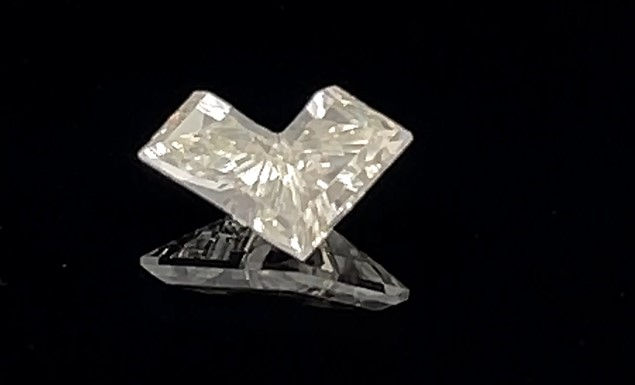 Matched pair of Alphabets lab grown diamonds, 7.00 × 5.80 mm, D VS1, 0.96ct total