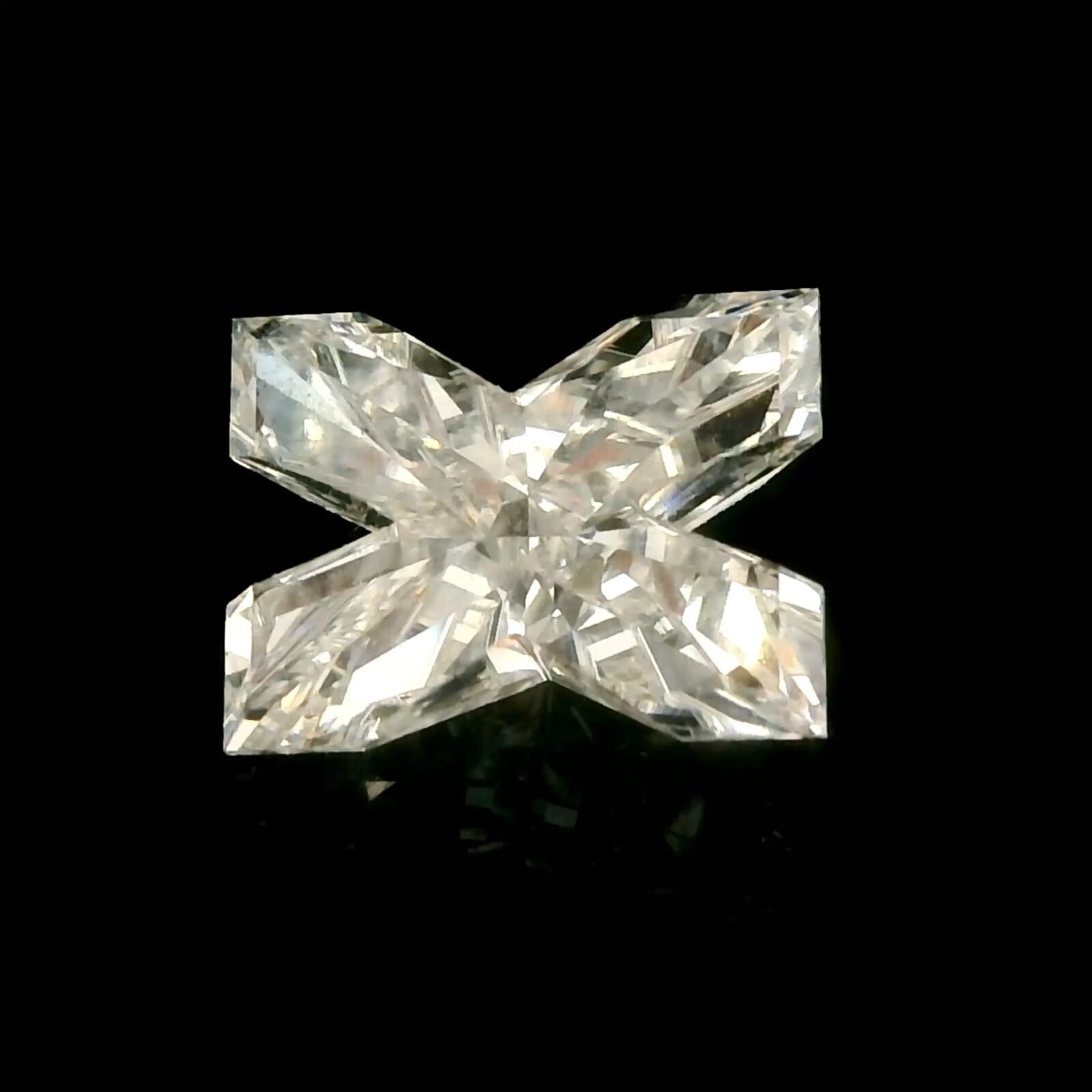 Matched pair of Alphabets lab grown diamonds, 9.15 × 6.82 mm, F VVS2, 2.02ct total