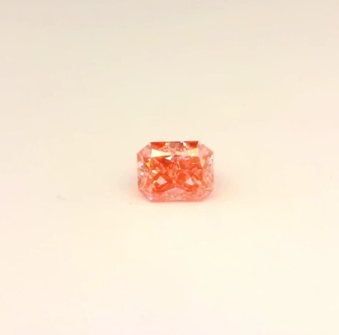 Matched pair of Radiant Cut lab grown diamonds, 12.30 × 8.30 mm, Fancy Vivid Pink VS1, 1.15ct total