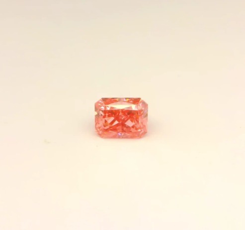 Matched pair of Radiant Cut lab grown diamonds, 6.10 × 4.80 mm, Fancy Vivid Pink VS2, 1.10ct total