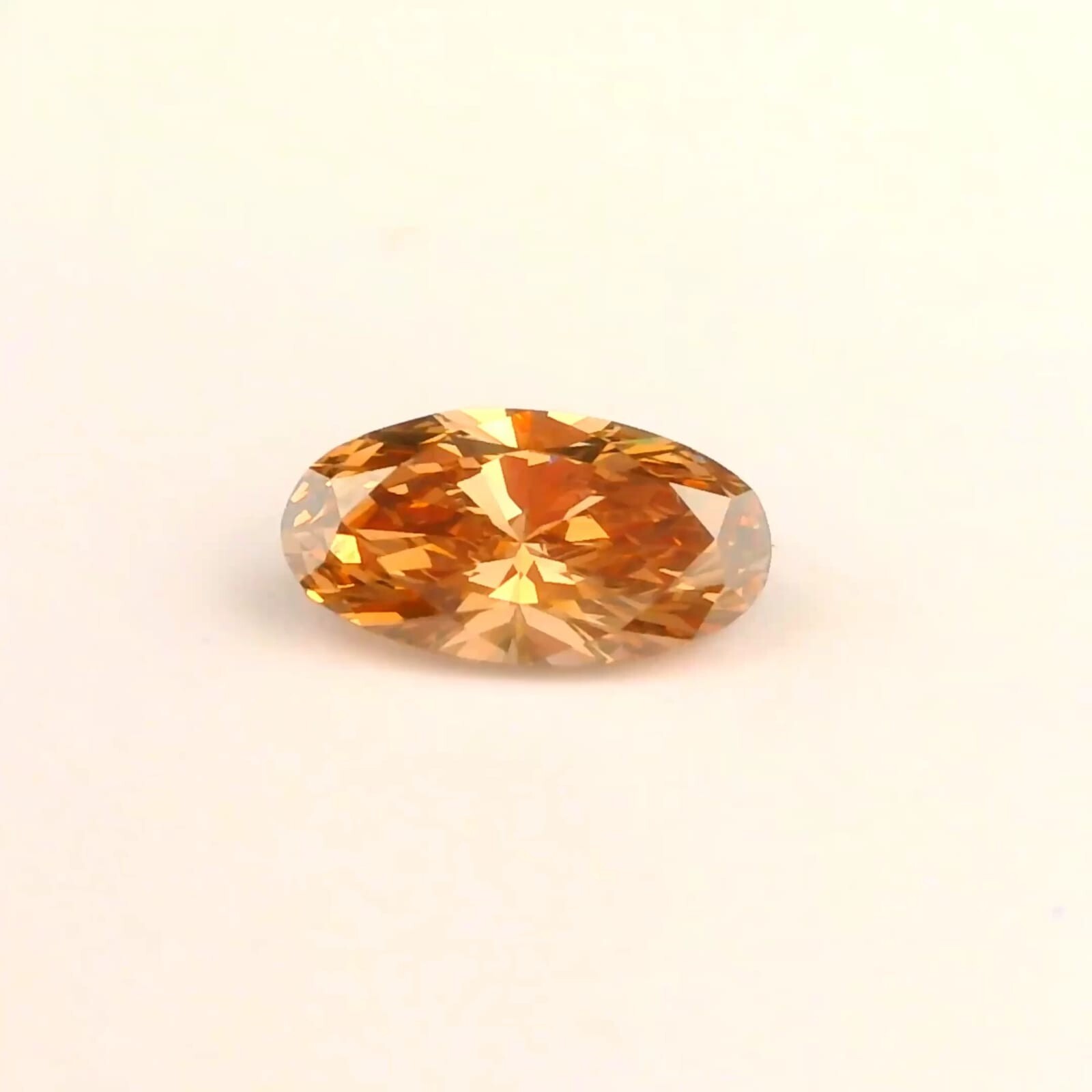 Matched pair of Moval lab grown diamonds, 8.50 × 4.50 mm, Fancy Brown VS1, 0.69ct total
