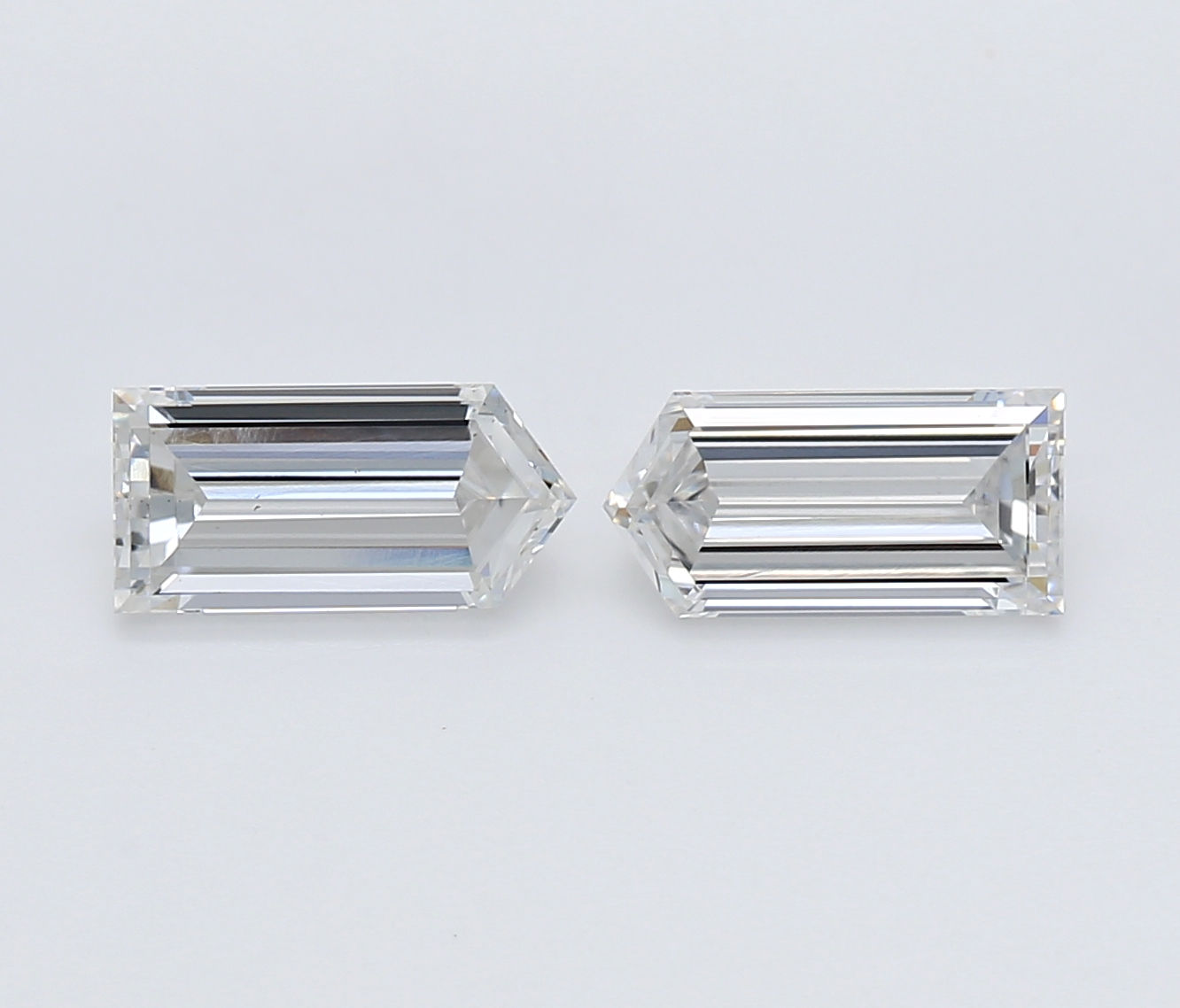Matched pair of Bullet lab grown diamonds, 7.00 × 3.50 mm, F VVS2, 1.06ct total